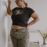The Churro Bear Ruffle Trim Baby Tee in Vintage Black