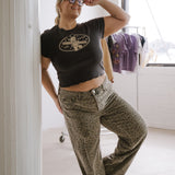 The Churro Bear Ruffle Trim Baby Tee in Vintage Black