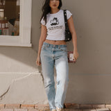 Shop Bibliophile x Subtle Dust: The Buy Me Books Ruffle Trim Baby Tee in White