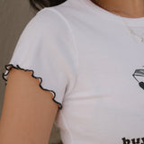 Shop Bibliophile x Subtle Dust: The Buy Me Books Ruffle Trim Baby Tee in White