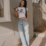 Shop Bibliophile x Subtle Dust: The Buy Me Books Ruffle Trim Baby Tee in White