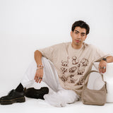 The AI Dino Oversized Tee in Sand