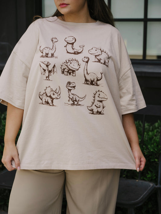 The AI Dinos Oversized Tee in Sand