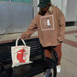 The Spooky Friends Oversized Crewneck in Latte