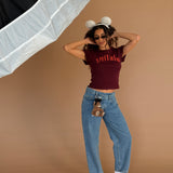 The Villain Baby Tee in Maroon