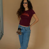 The Villain Baby Tee in Maroon