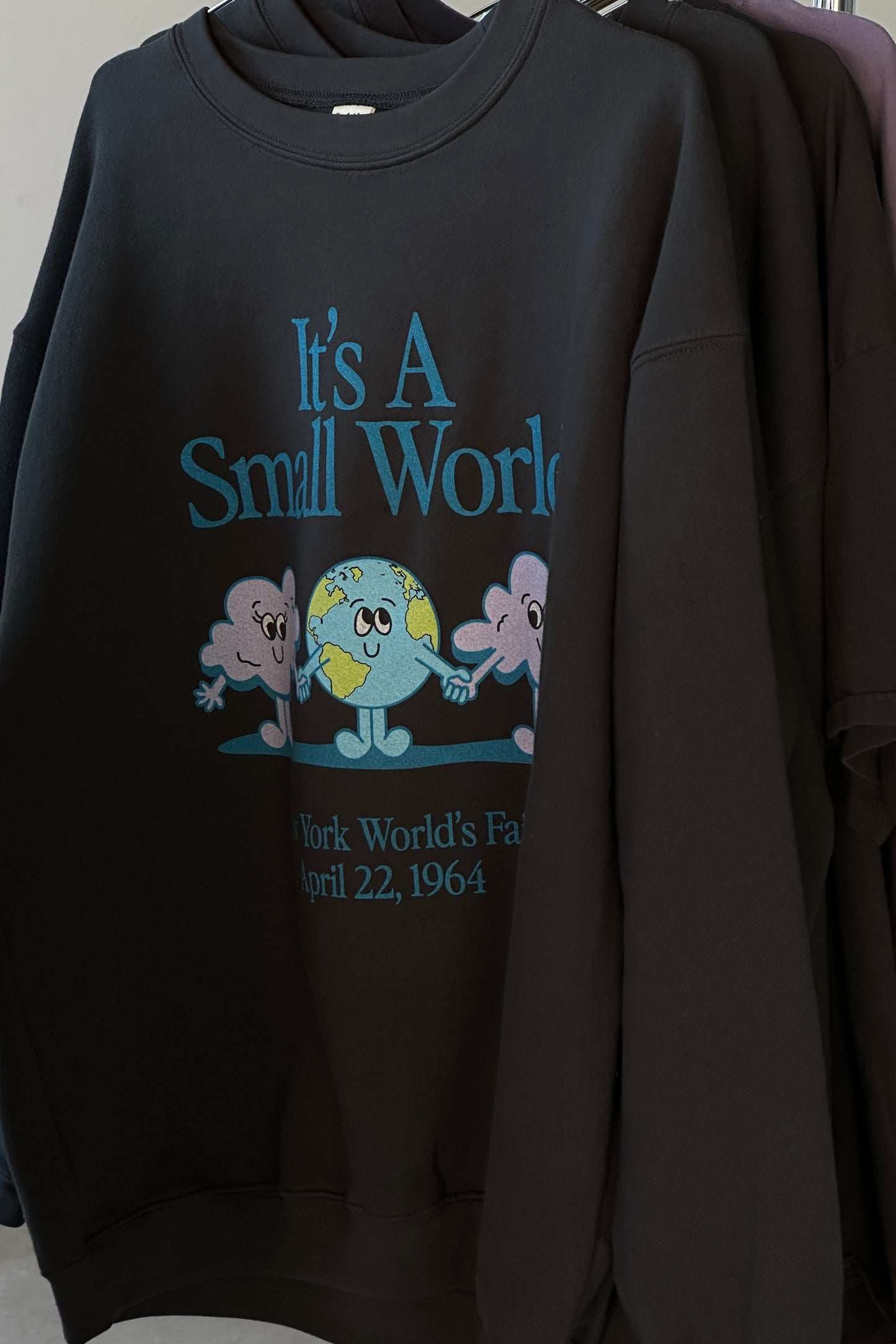 The Small World Oversized Crewneck in Vintage Black