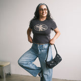 The Churro Bear Ruffle Trim Baby Tee in Vintage Black