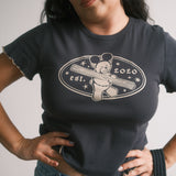 The Churro Bear Ruffle Trim Baby Tee in Vintage Black