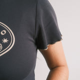 The Churro Bear Ruffle Trim Baby Tee in Vintage Black