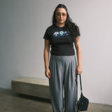 The Small World Baby Tee in Black