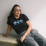 The Small World Baby Tee in Black