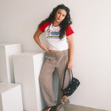 The World Showcase Raglan Baby Tee