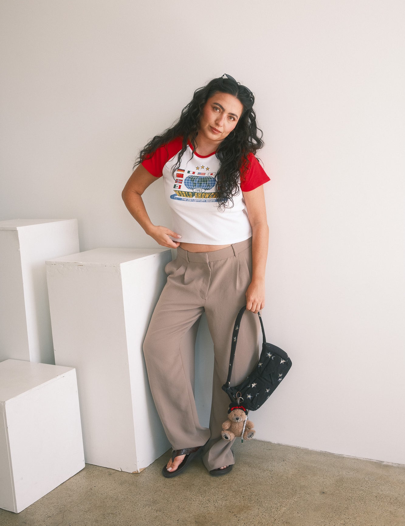 The World Showcase Raglan Baby Tee