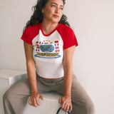 The World Showcase Raglan Baby Tee