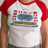 The World Showcase Raglan Baby Tee