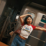 The World Showcase Raglan Baby Tee