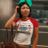 The World Showcase Raglan Baby Tee