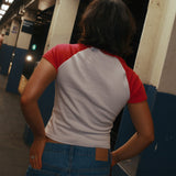 The World Showcase Raglan Baby Tee