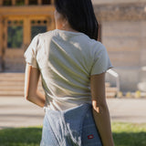 The Hundred Acre Wood Ruffle Trim Baby Tee in Sand